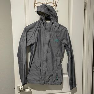 North face lightweight windbreaker grey with light blue detail reflective